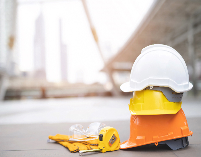 yellow and white hard safety wear helmet hat in the project at c